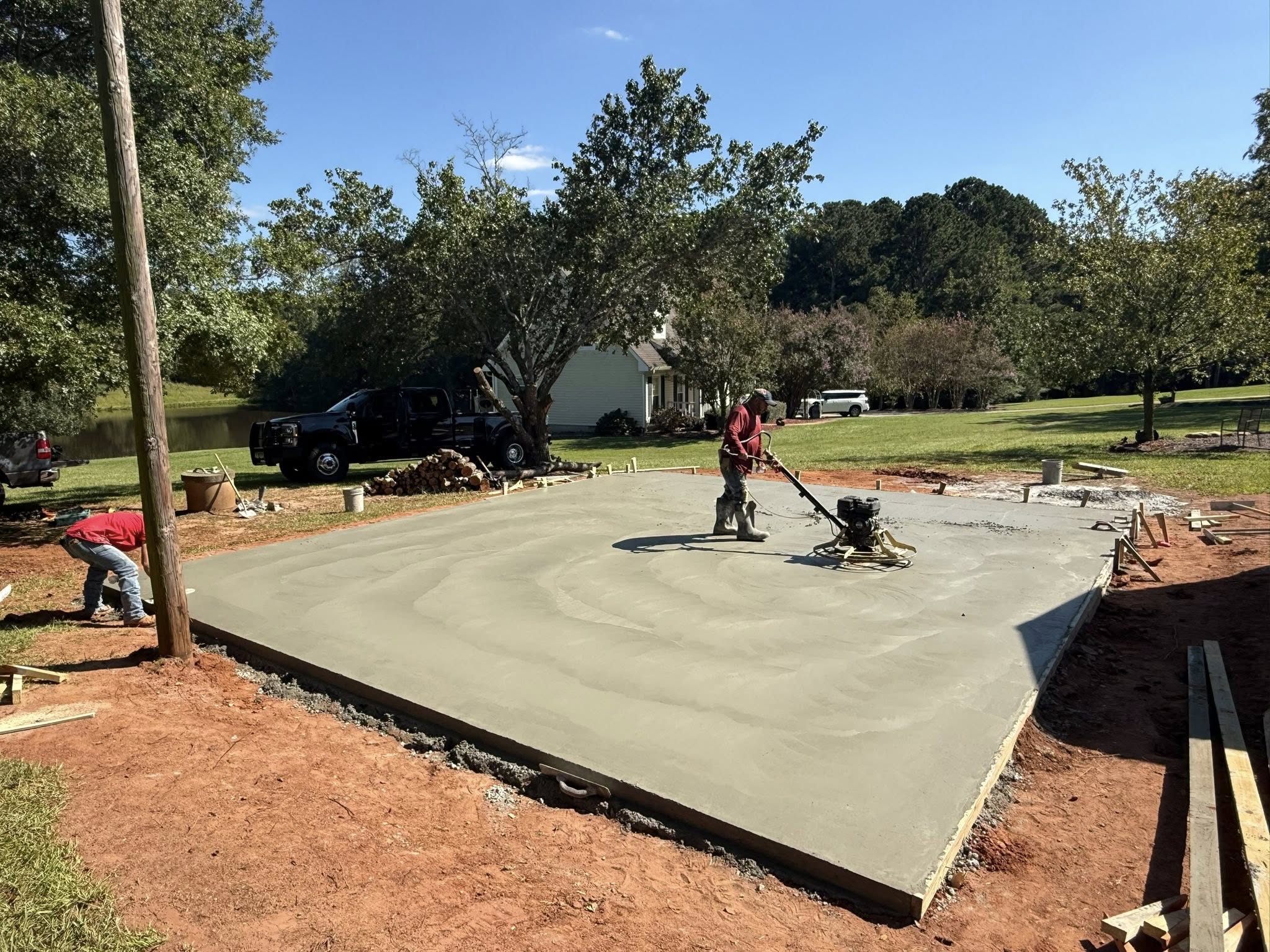 brown and white house near body of water