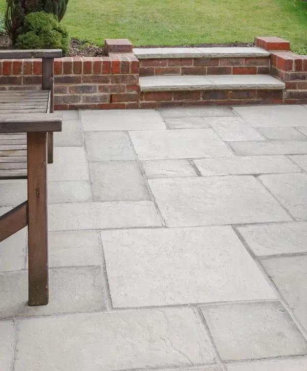  Close-up of clean, bright concrete pavers on a backyard patio