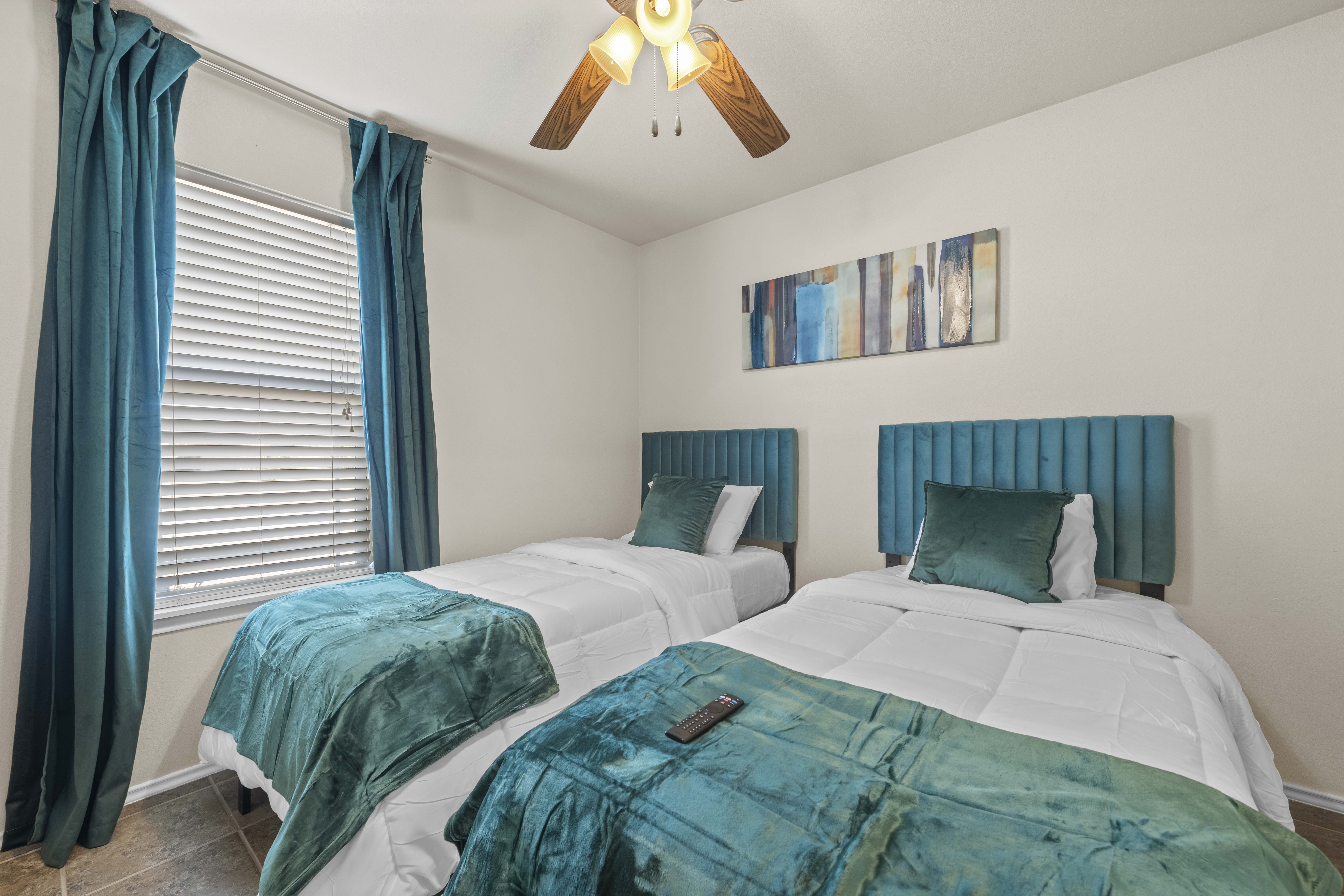 A house with a fence in front of it