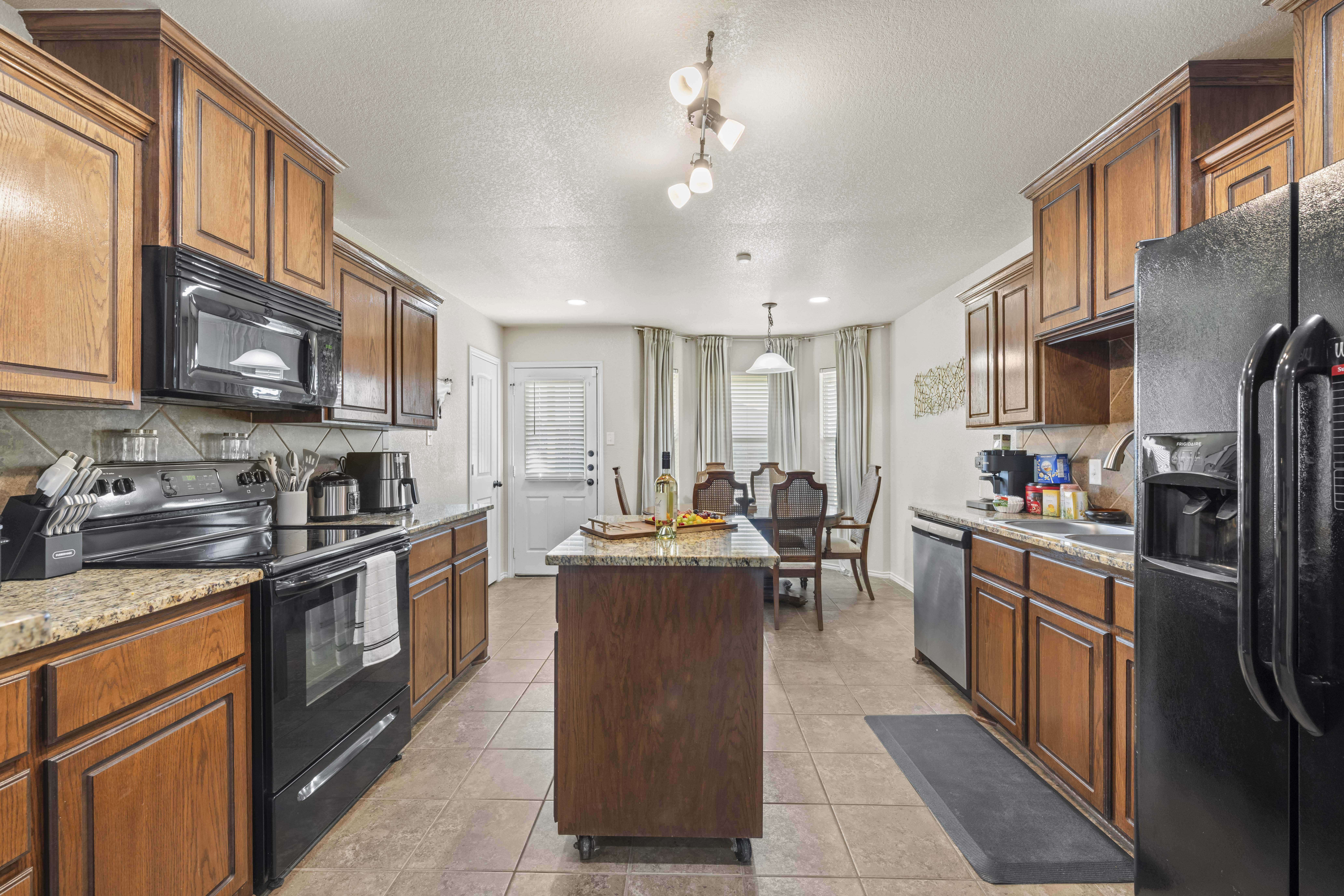 people sitting on grass field