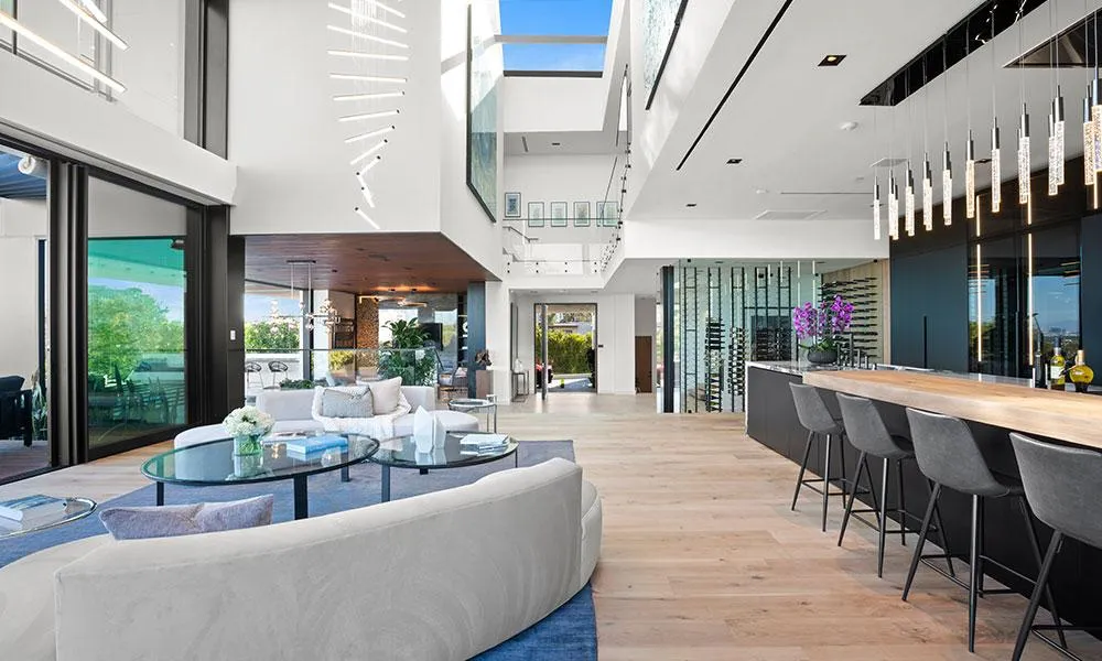 A kitchen with a plant in the middle of the counter
