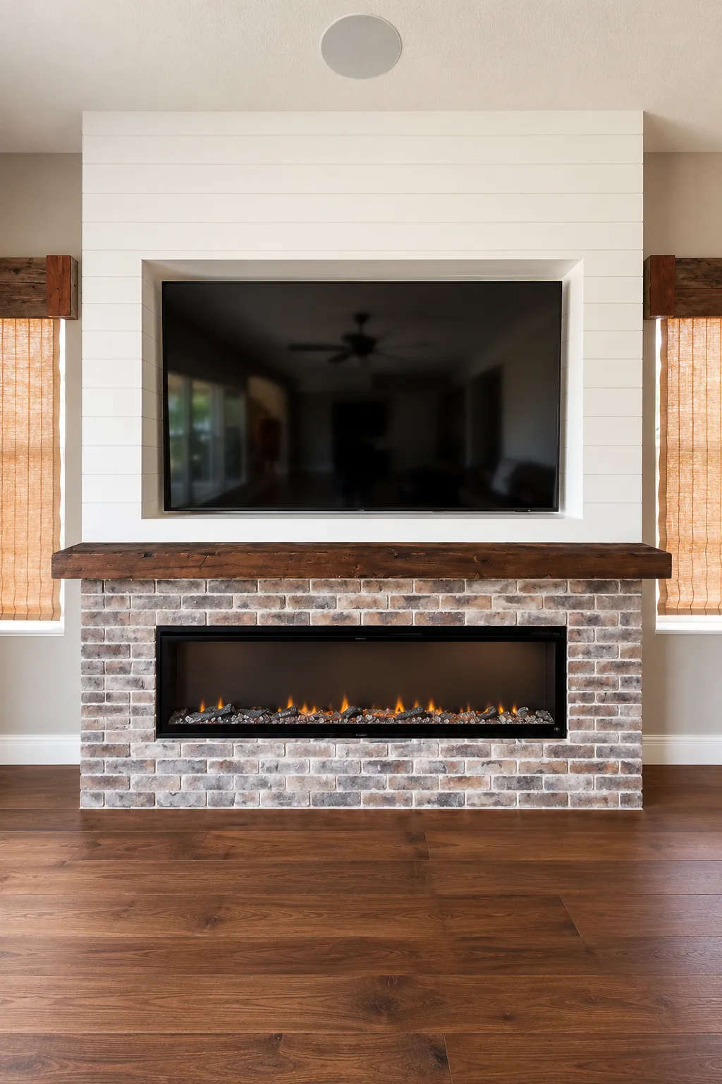 fireplace and mantle custom built with shiplap and low profile fireplace