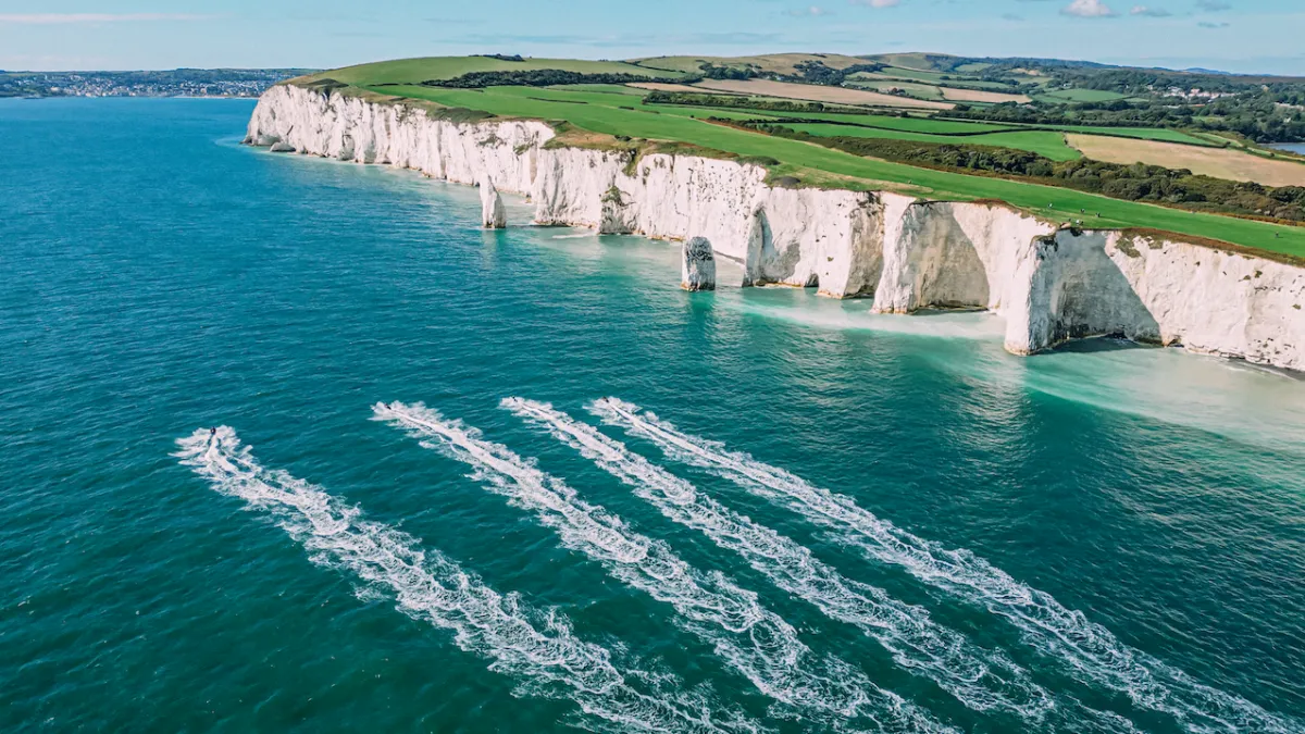 Person riding a jetski during a fitness-focused session at New Wave Club