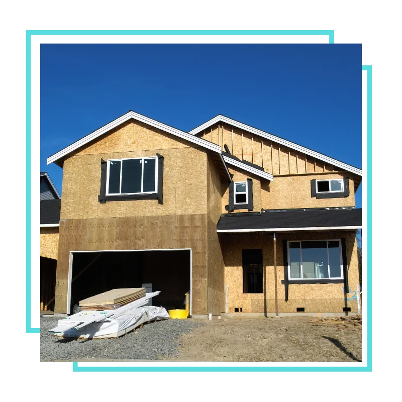 Room addition contractors reviewing a home addition layout in Centreville