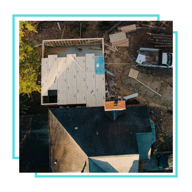 Roofing Company in Fairfax, VA checking roof shingles