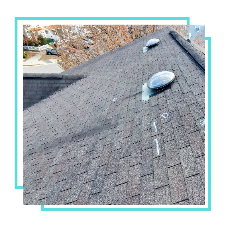 Shingle repair by a roofing team in Centreville, VA