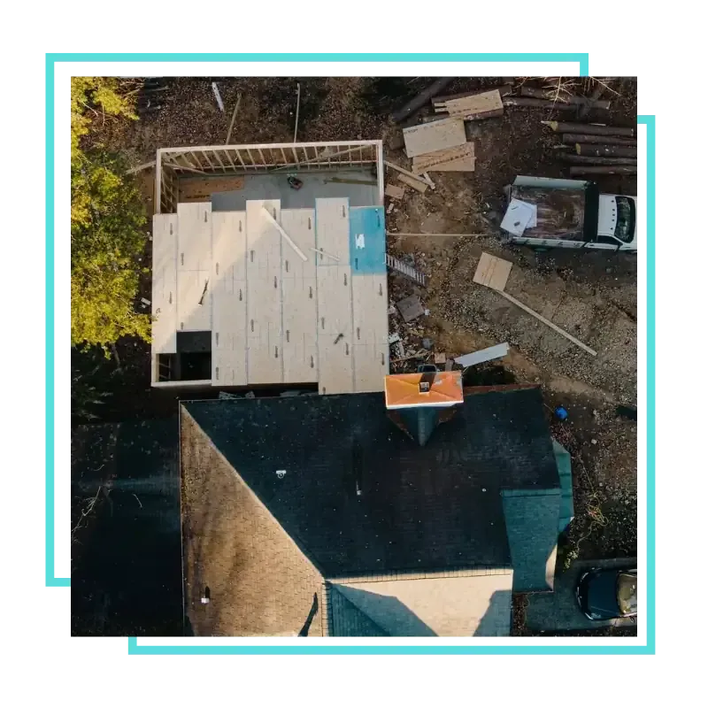 Roofing Company in Fairfax, VA checking roof shingles