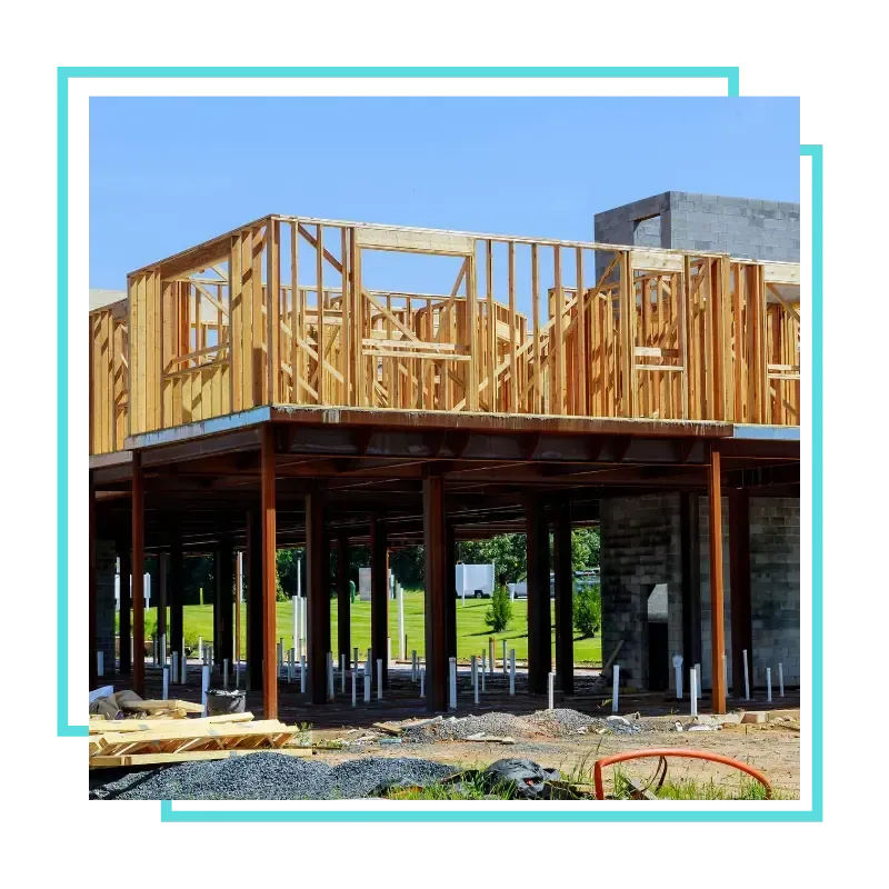 Commercial contractor reviewing a business construction space