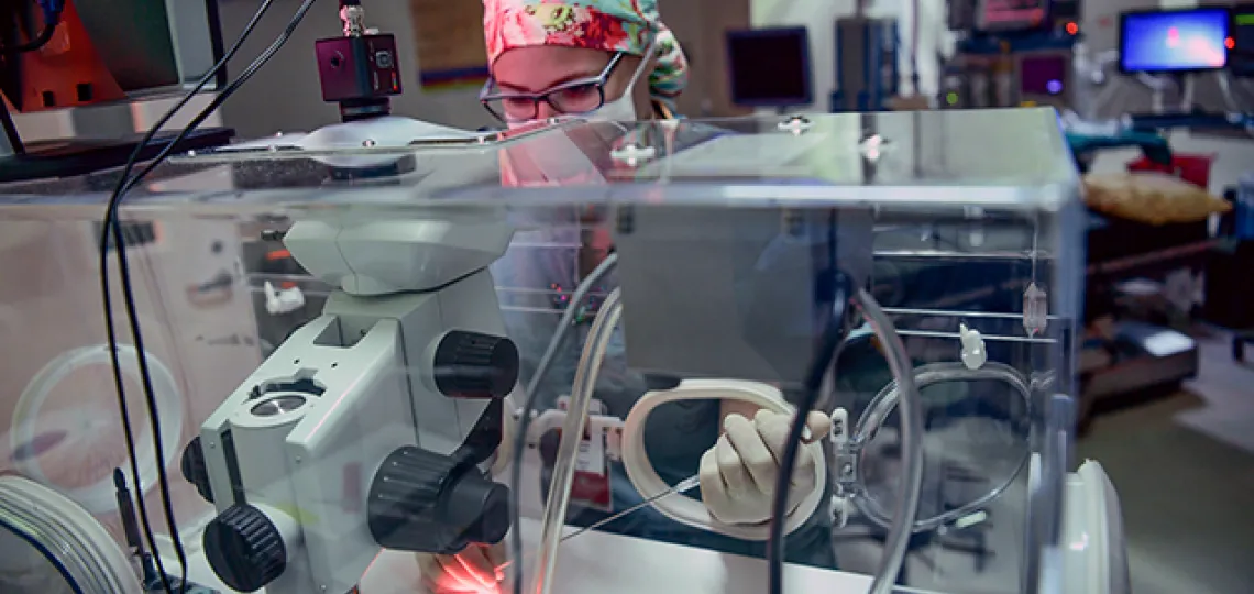 Medical specialist using advanced diagnostic equipment for fertility evaluation and hormonal testing at Cleenixx Clinic in Ilorin.