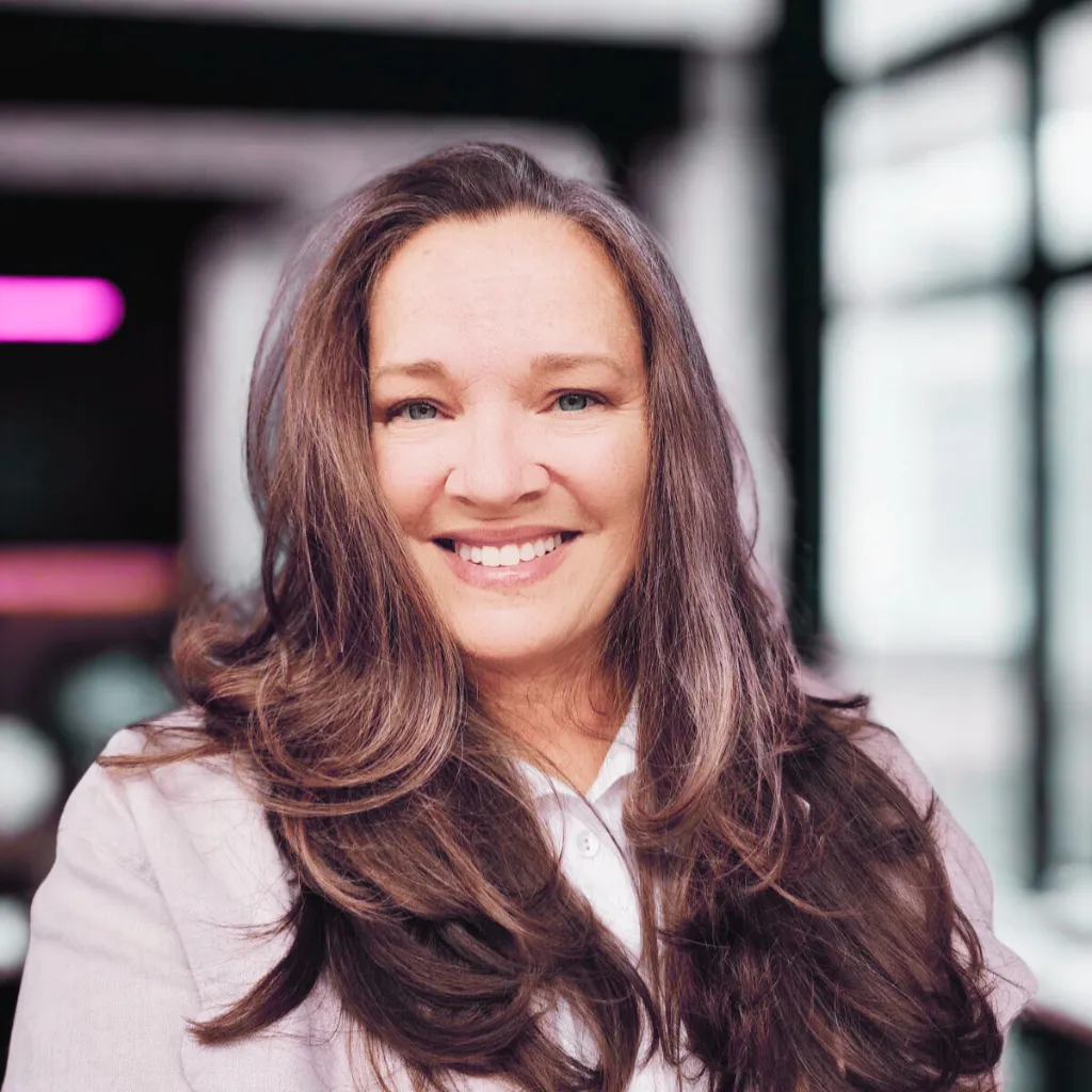 Loretta Worley smiling gently in warm natural light