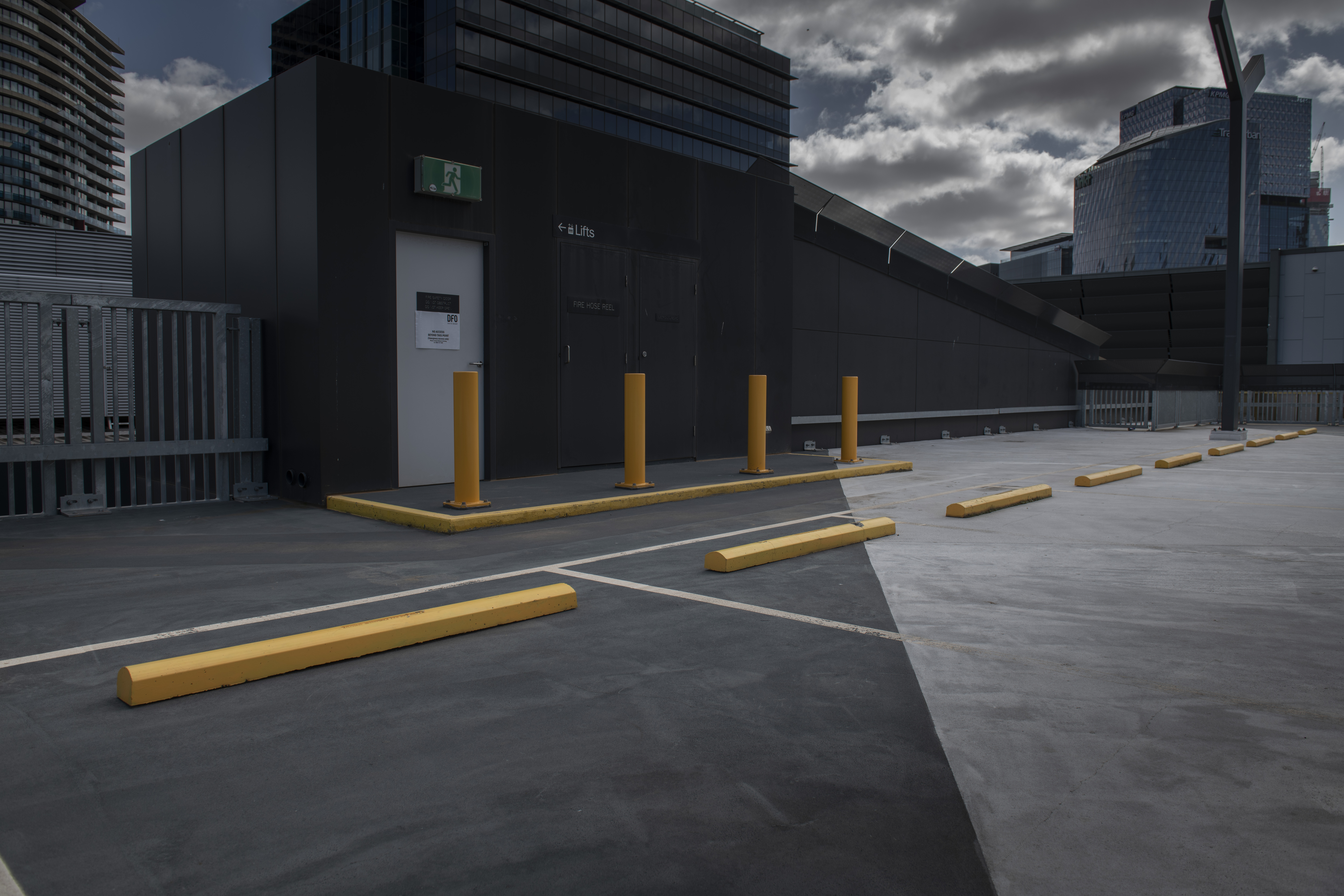 a red and white sign with a man on skis