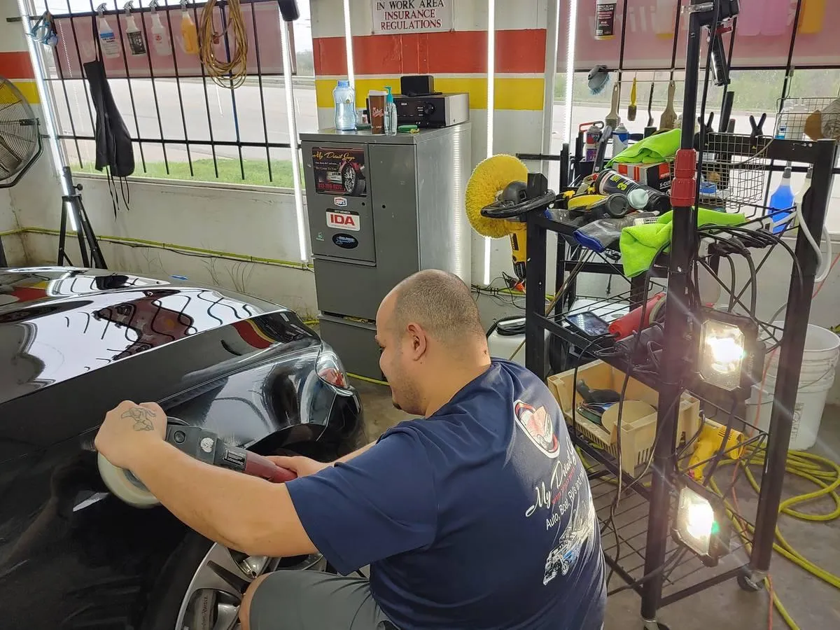 Ceramic coating application on vehicle by Fort Worth detailing professionals