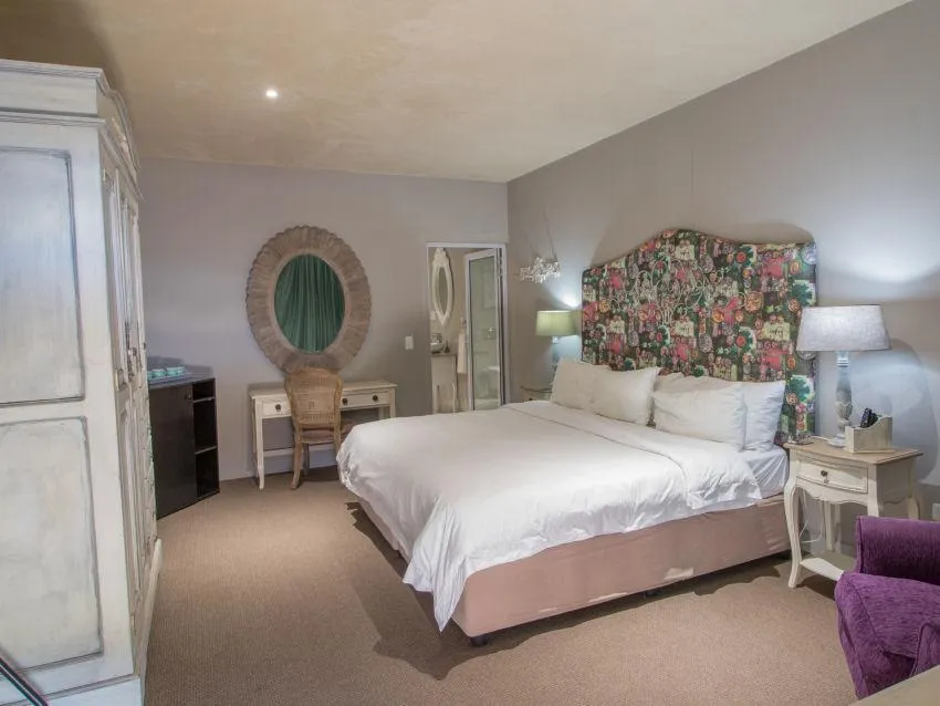 a room with a bar and stools