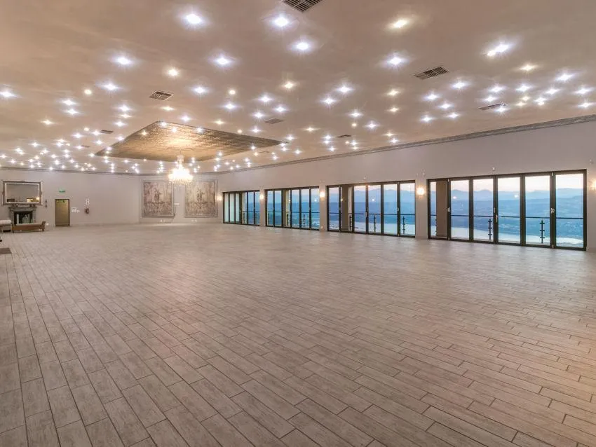 black and brown wooden table near blue padded chair