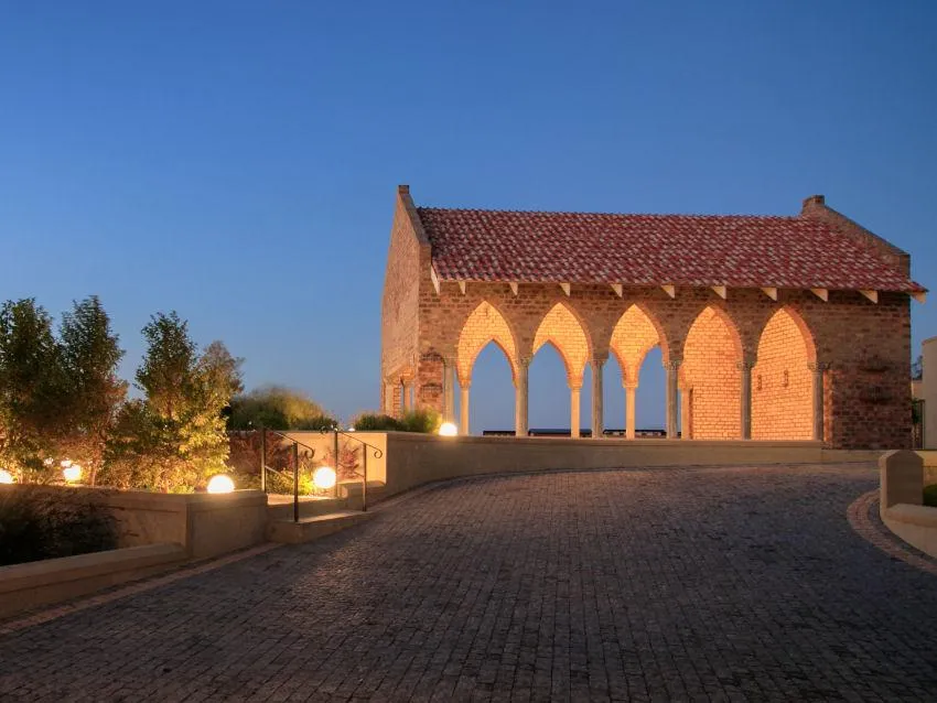black and brown wooden table near blue padded chair