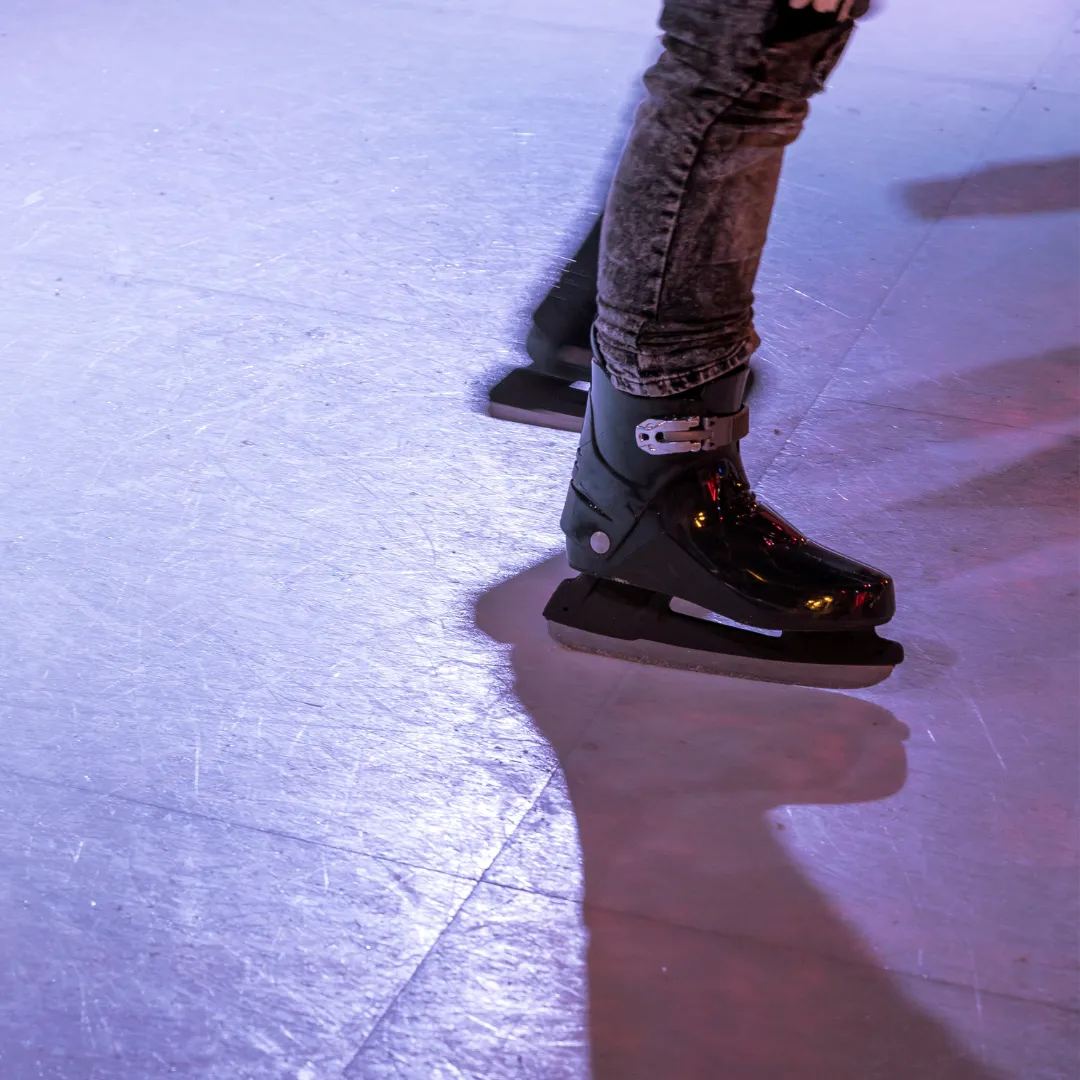a room with a bar and stools