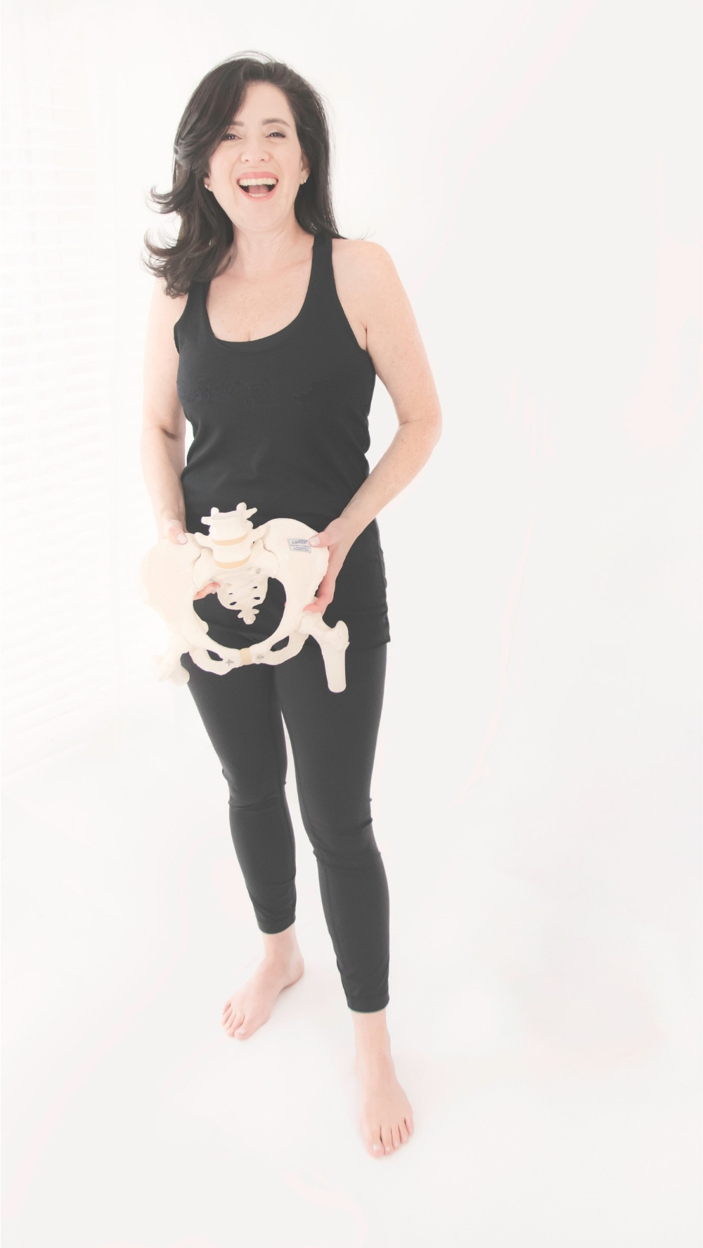 Tracy Seider demonstrating pelvic and skeletal alignment