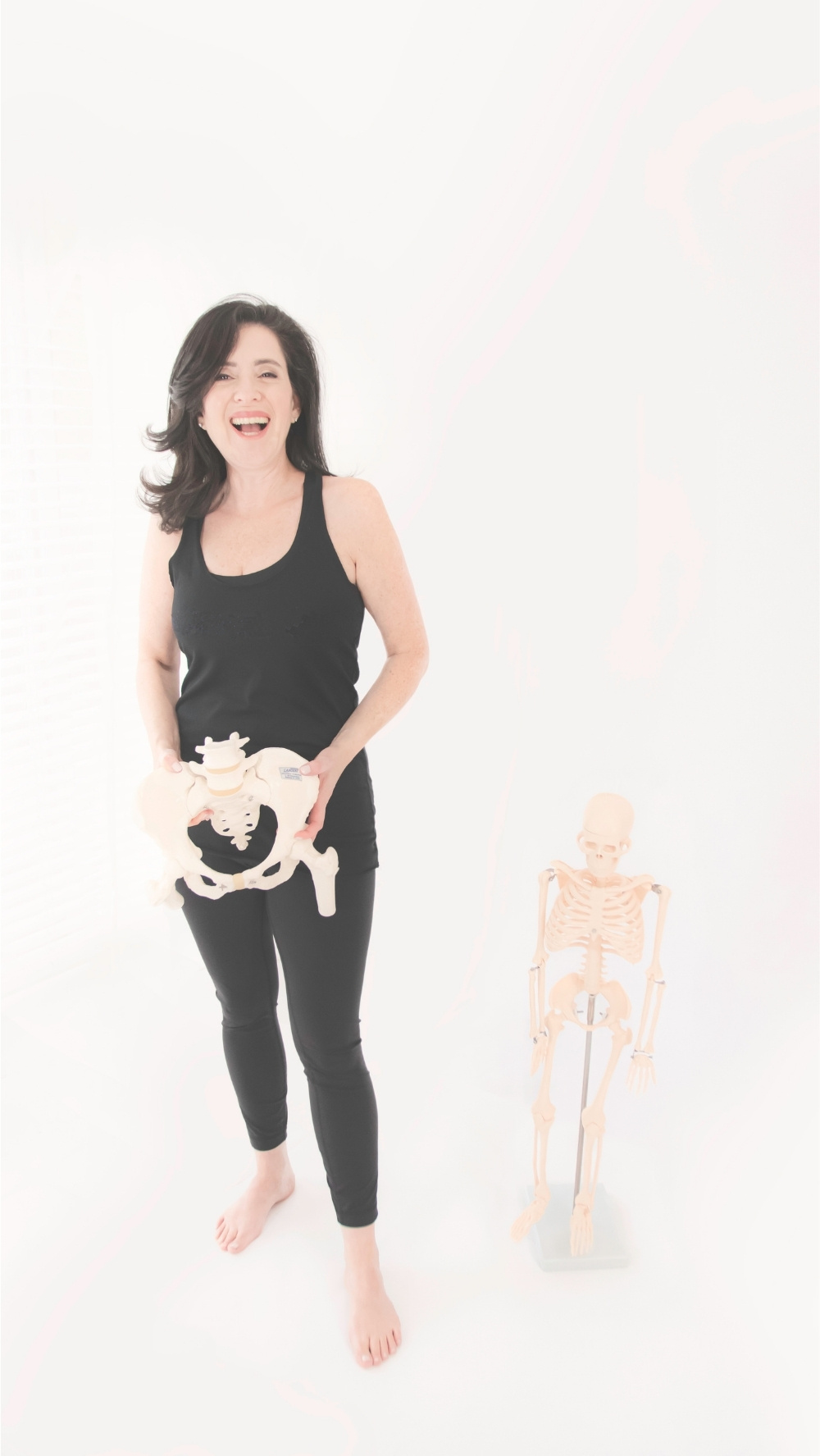 Tracy Seider demonstrating pelvic and skeletal alignment