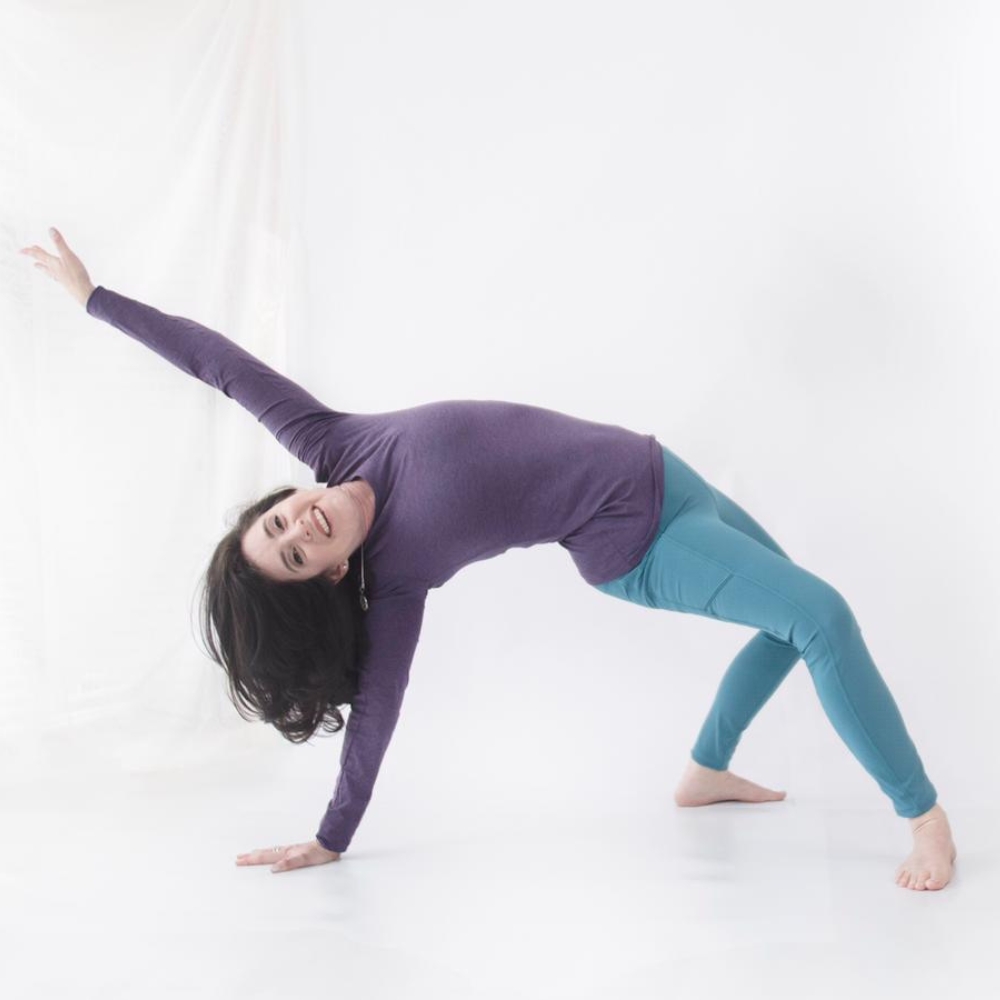 Tracy Seider demonstrating a full-body mobility and alignment movement