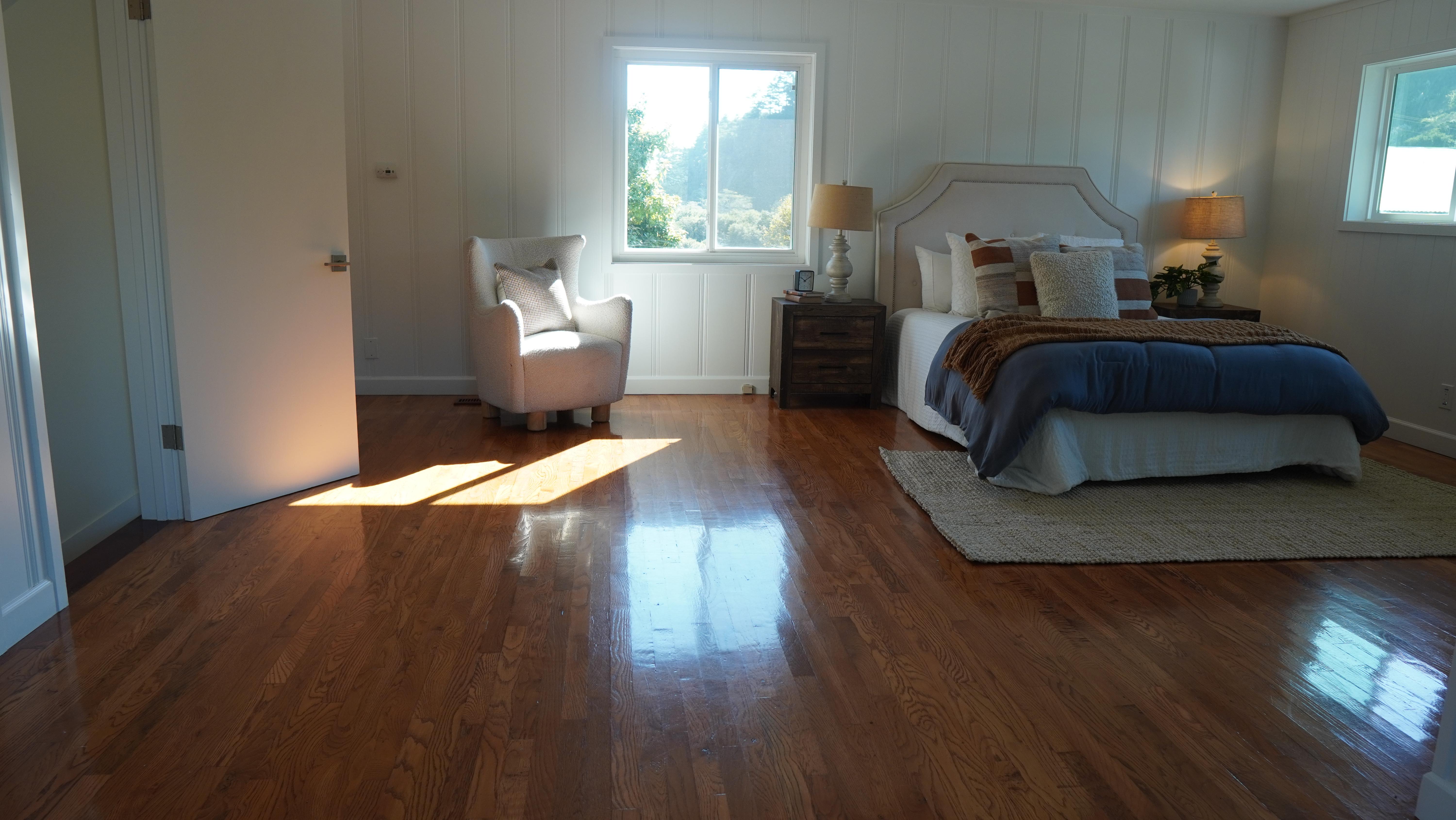 Refinished hardwood floor in master bedroom in Half Moon Bay, CA.