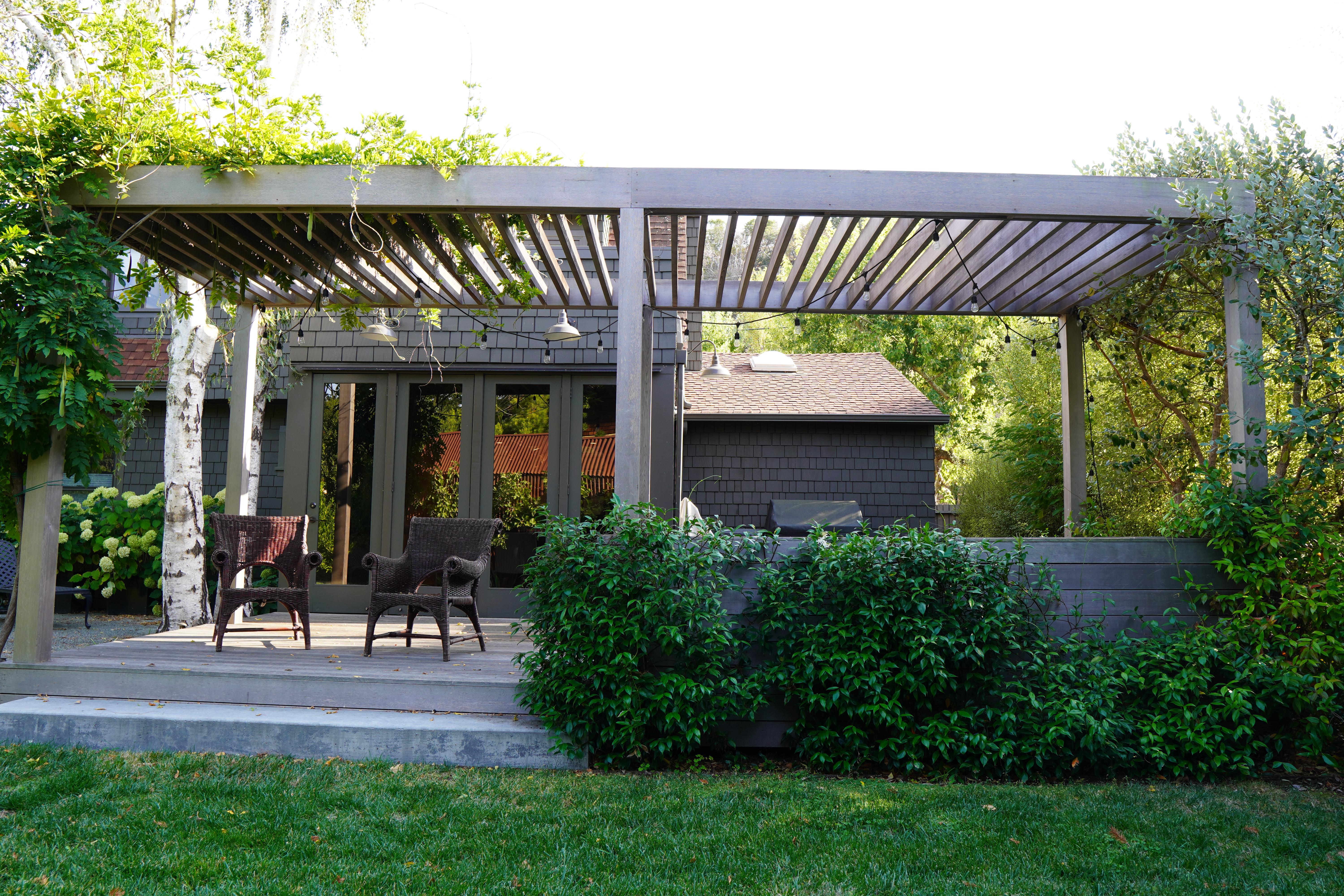 Weather grey pergola with concrete steps in Larkspur, CA.