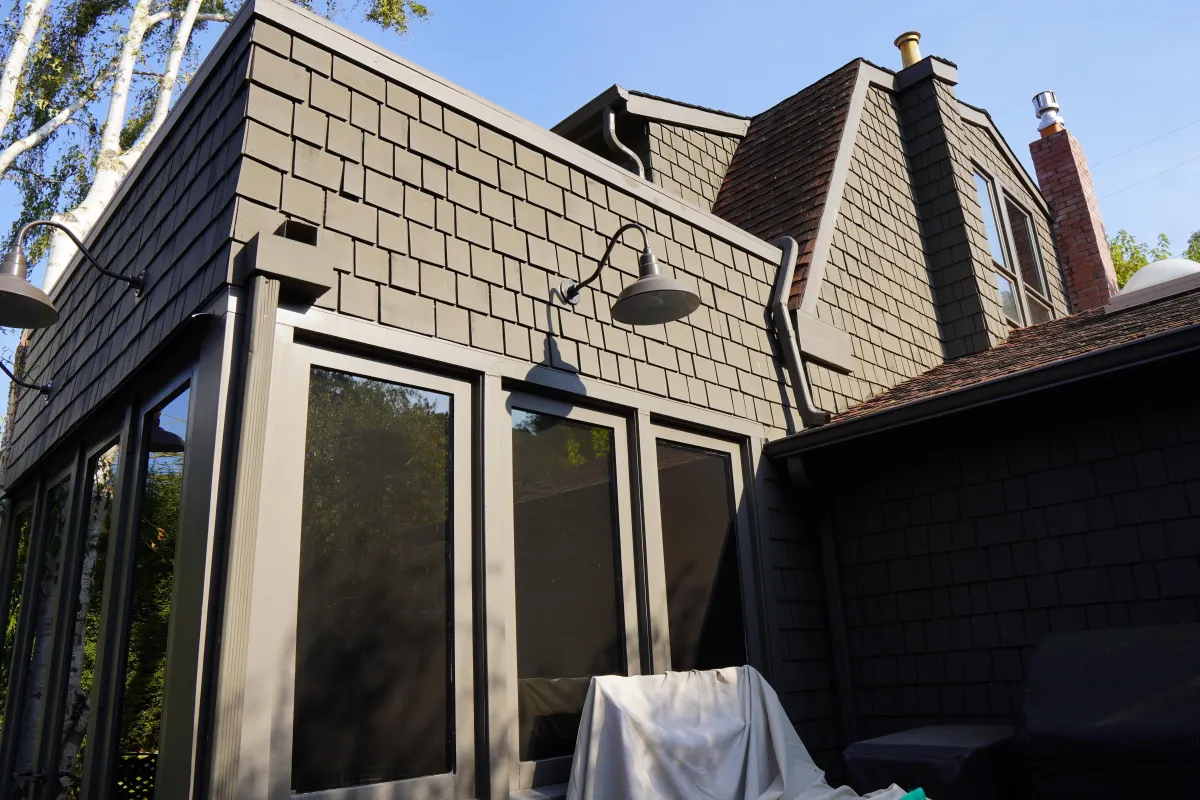 House with cedar shingles painted with grey color in Larkspur, CA.