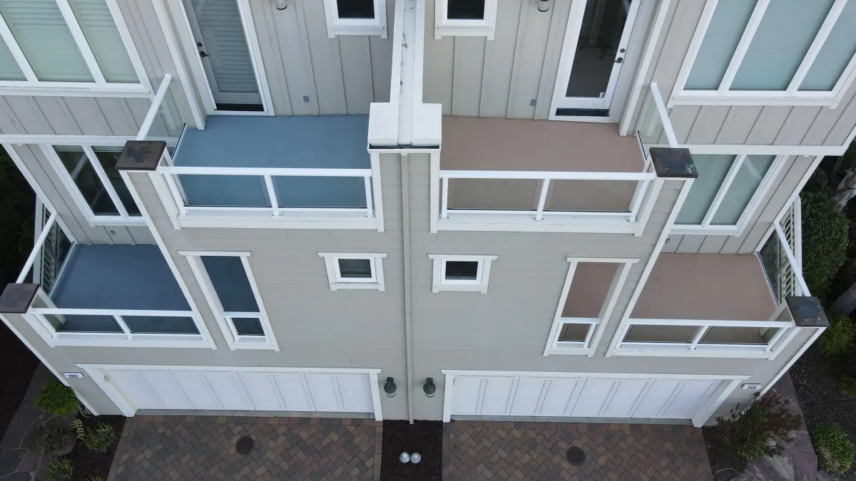 Deck water proofing with blue and beige finish colors in Tiburon, CA