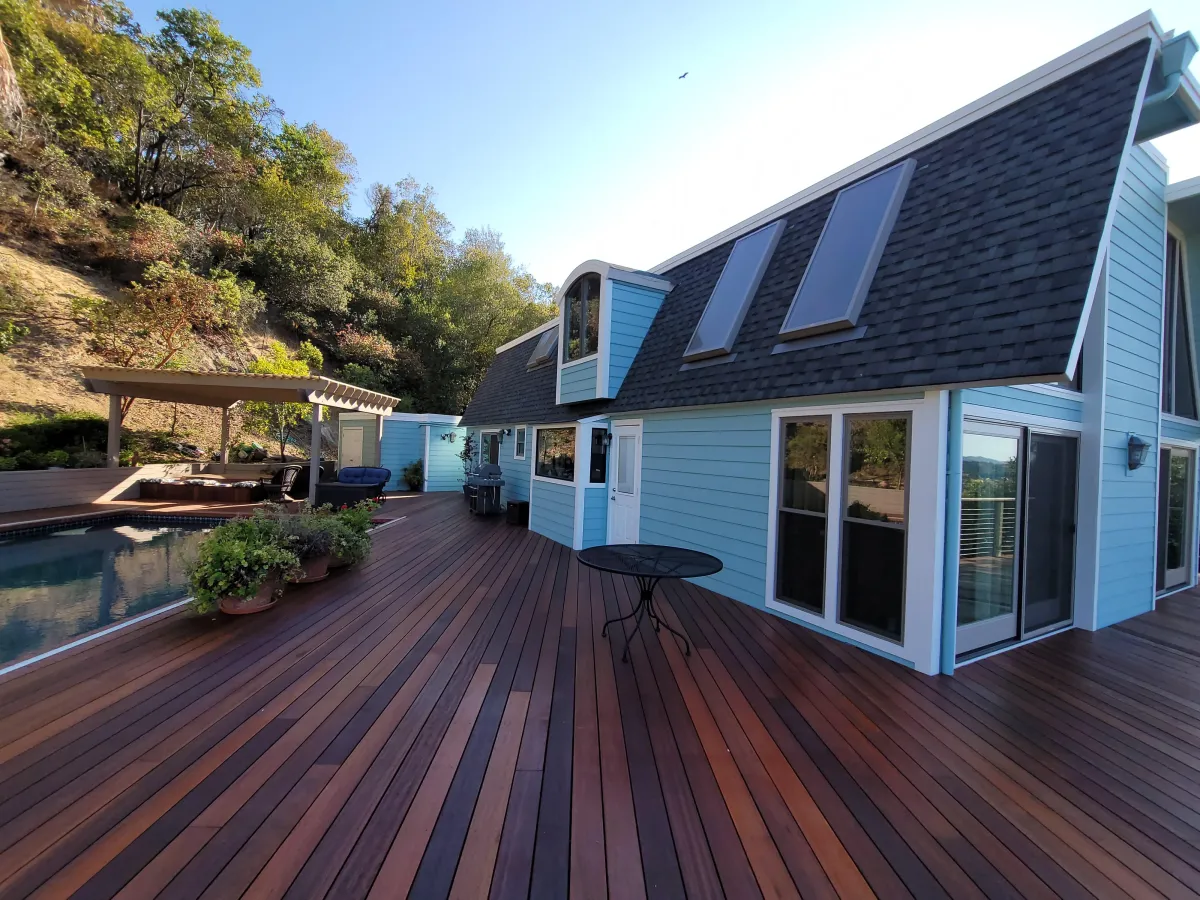 House with James Hardie lap siding, painted blue, an tropical new deck in Novato, CA.