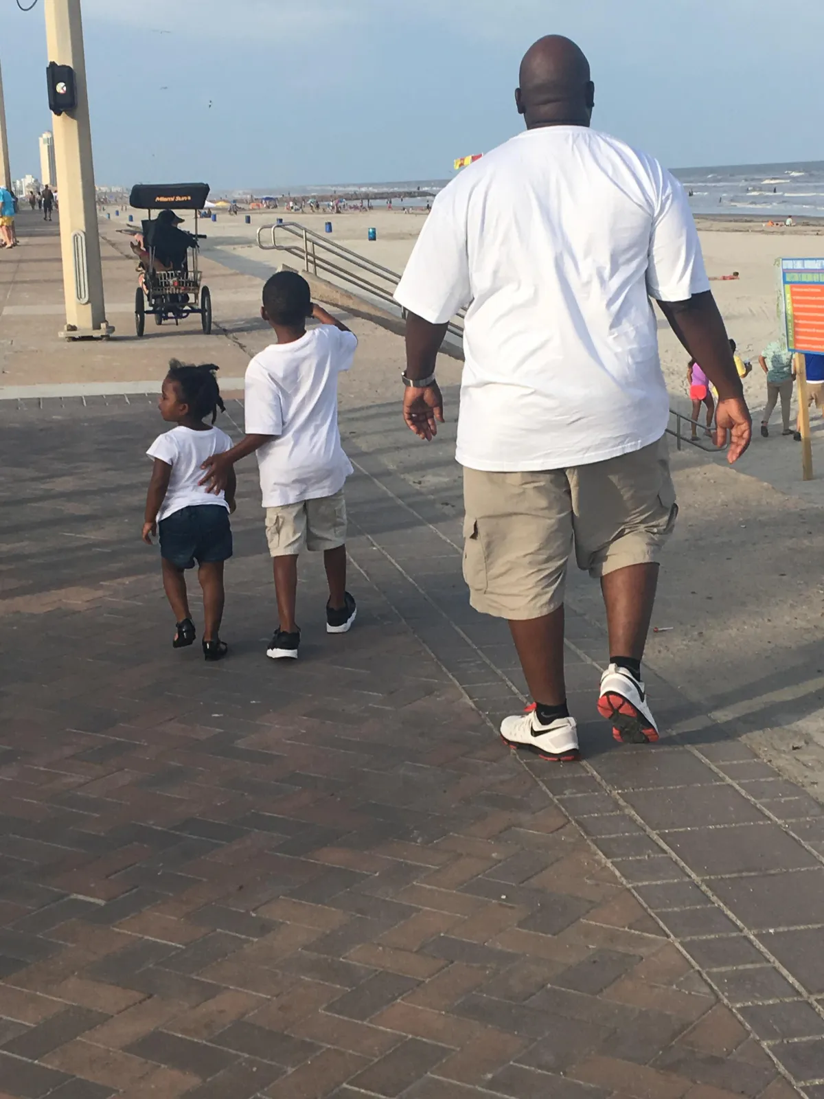 Documentary-style photo of Galveston architecture and walkable neighborhood streetscape