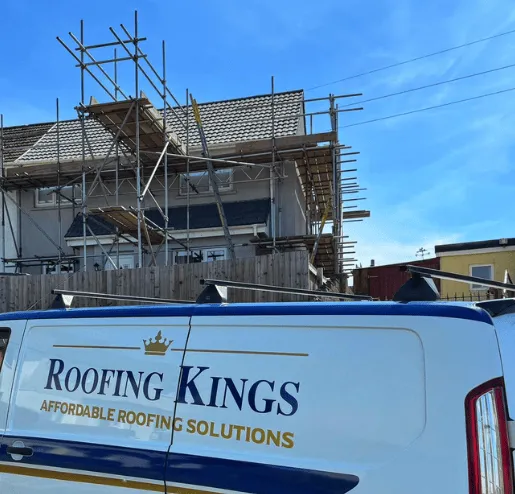 The Roofing Kings van parked in front of a roofing job in Hengoed