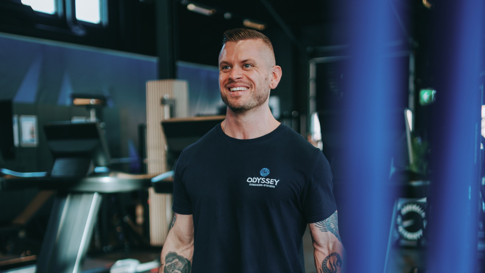 Johan Vesters standing in the gym in an Odyssey Coaching Systems shirt