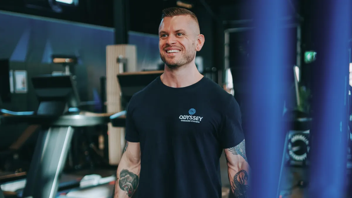 Johan Vesters, nutrition coach, smiling in a gym, for a post on blood sugar and reversing prediabetes