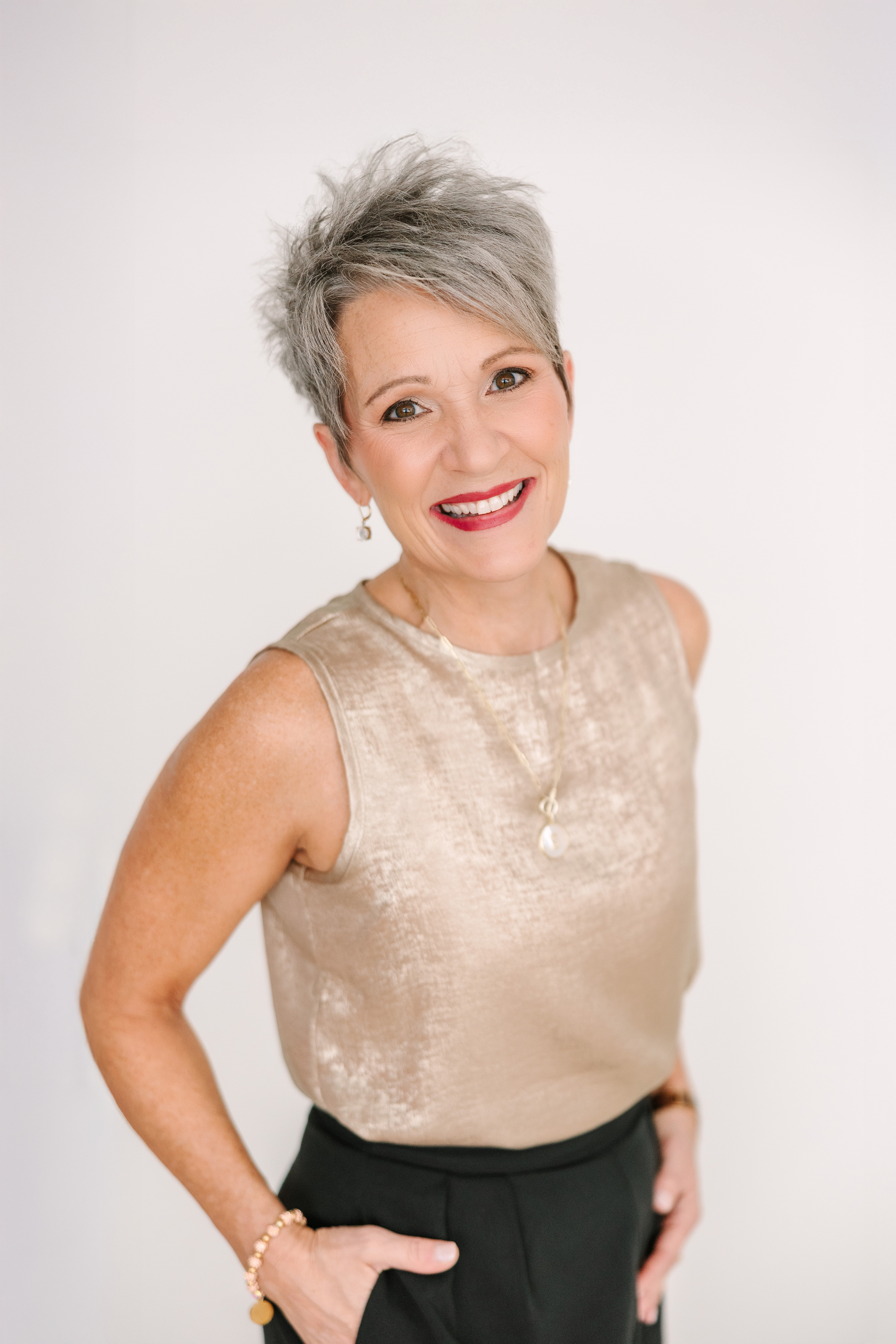 Susan Davis speaking confidently on a video call with coaching clients