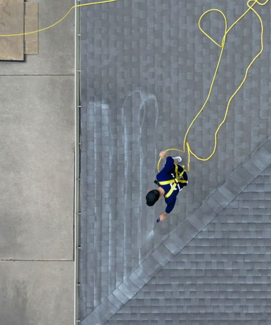 Professional roofer repairing roof with high-quality materials in the Midwest