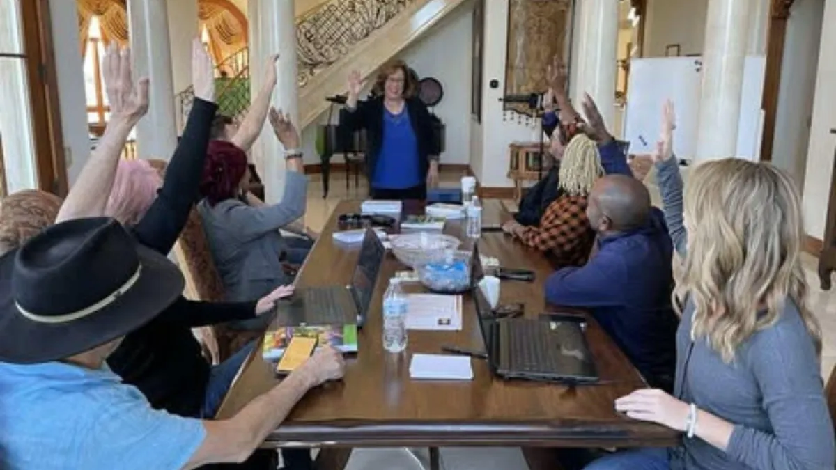 Margie Dunki-Jacobs presenting at a Mastermind