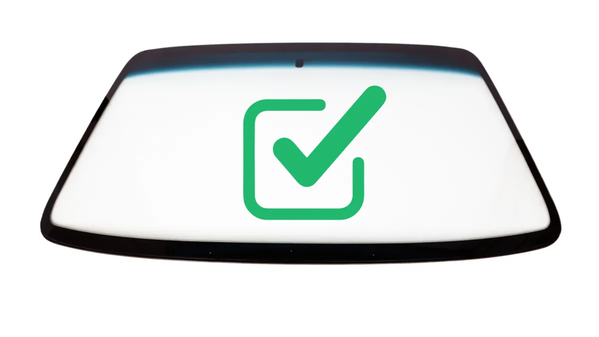 Windshield with white background and an on brand green check mark icon in the center.