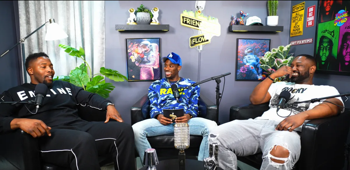 Portrait of main radio host in studio with headphones