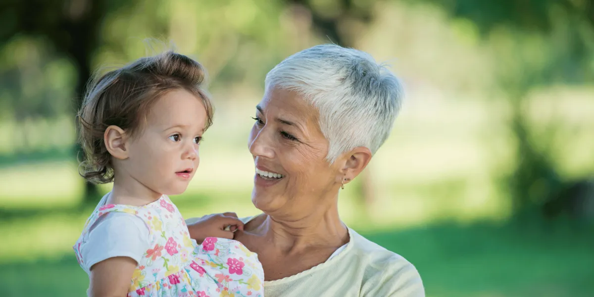 a woman getting a back massage from a massager