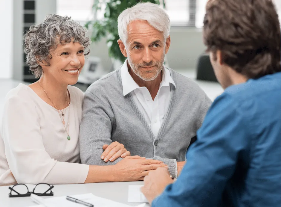 senior couple sitting at table
