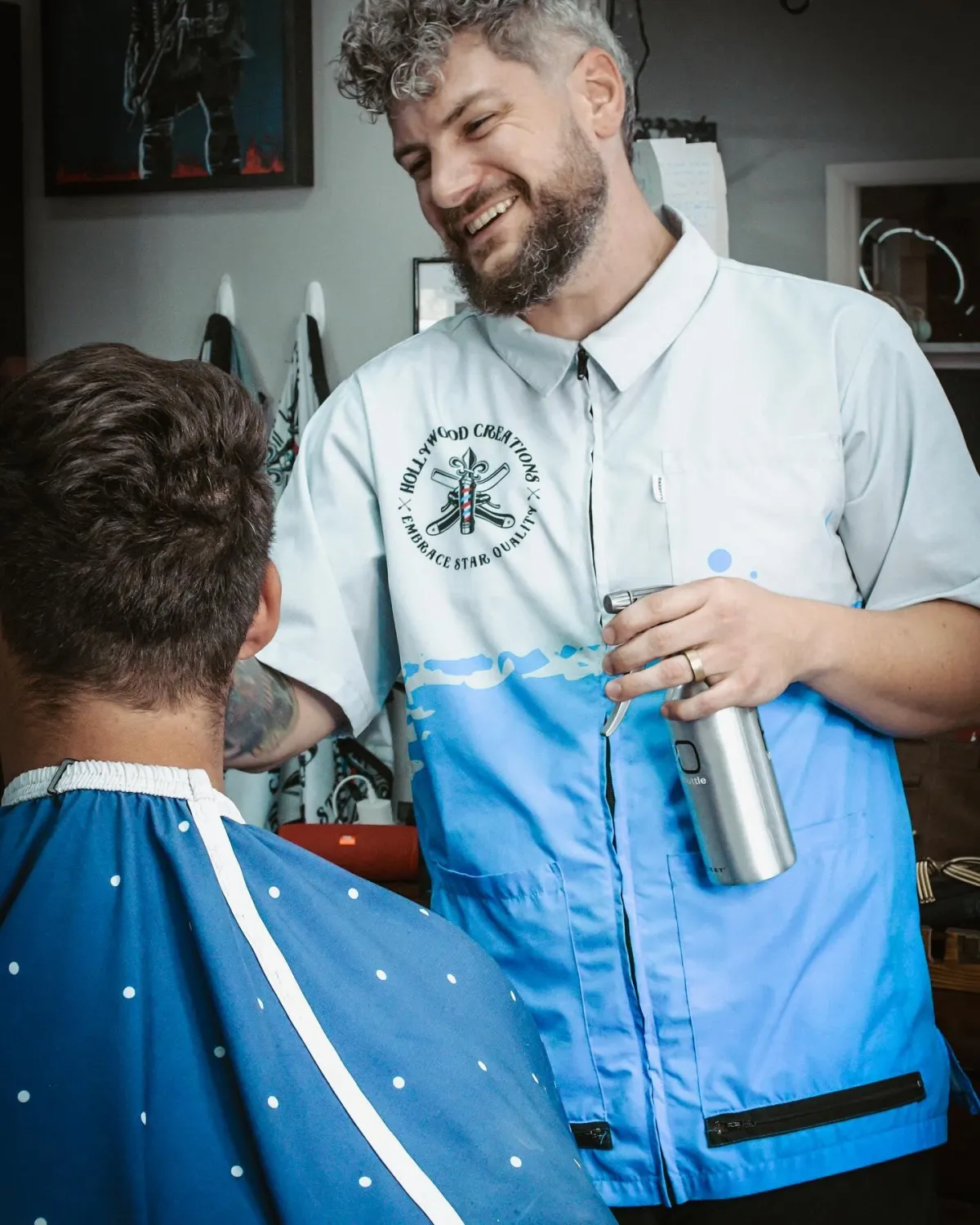 man hair cutting hair of man
