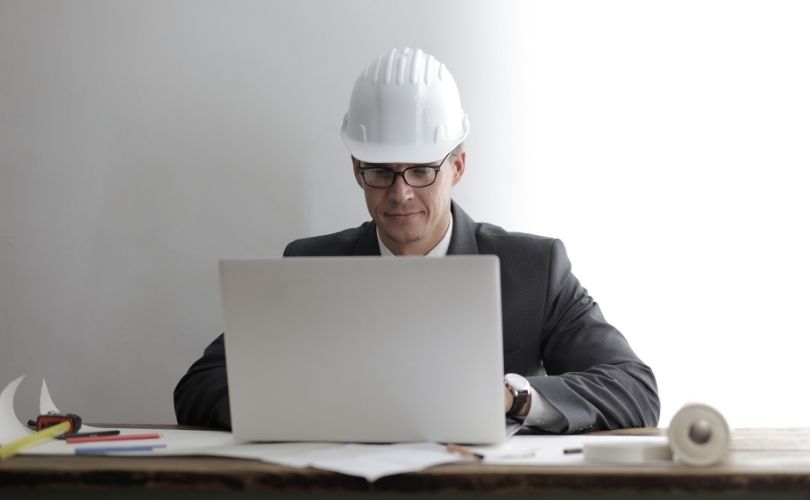trades business owner using a laptop