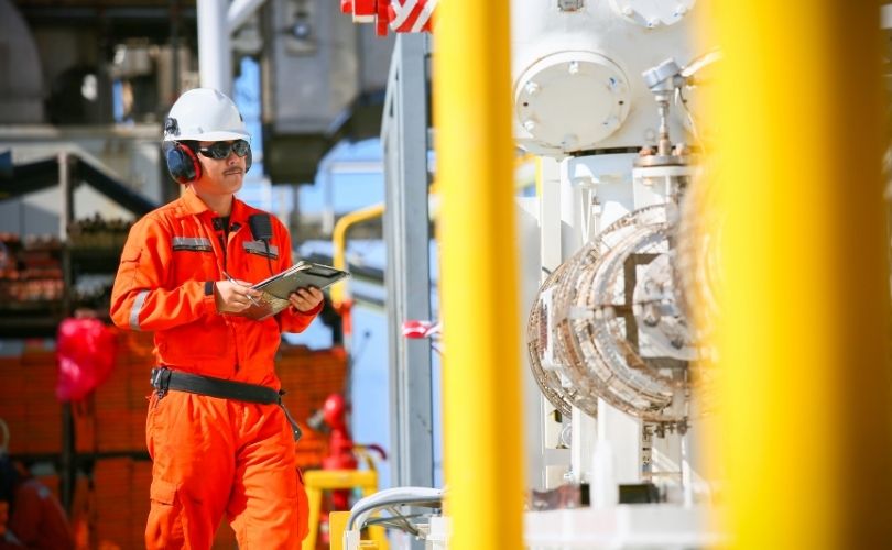 plumber talking on phone with operations support