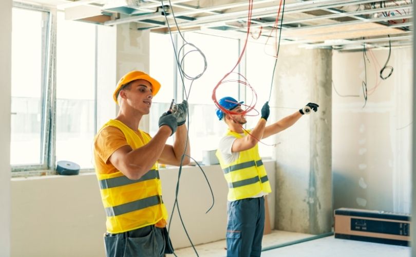 plumber talking on phone with operations support