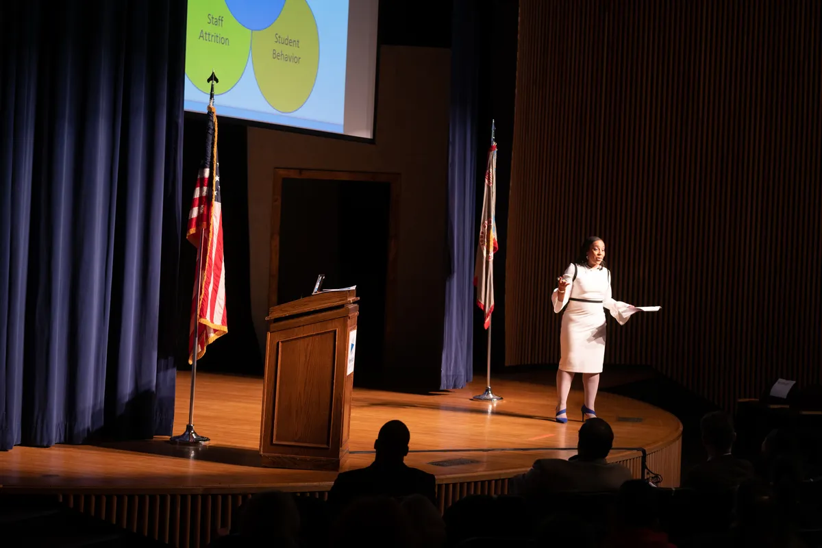 Dr. Shelley addressing a captivated audience of corporate leaders