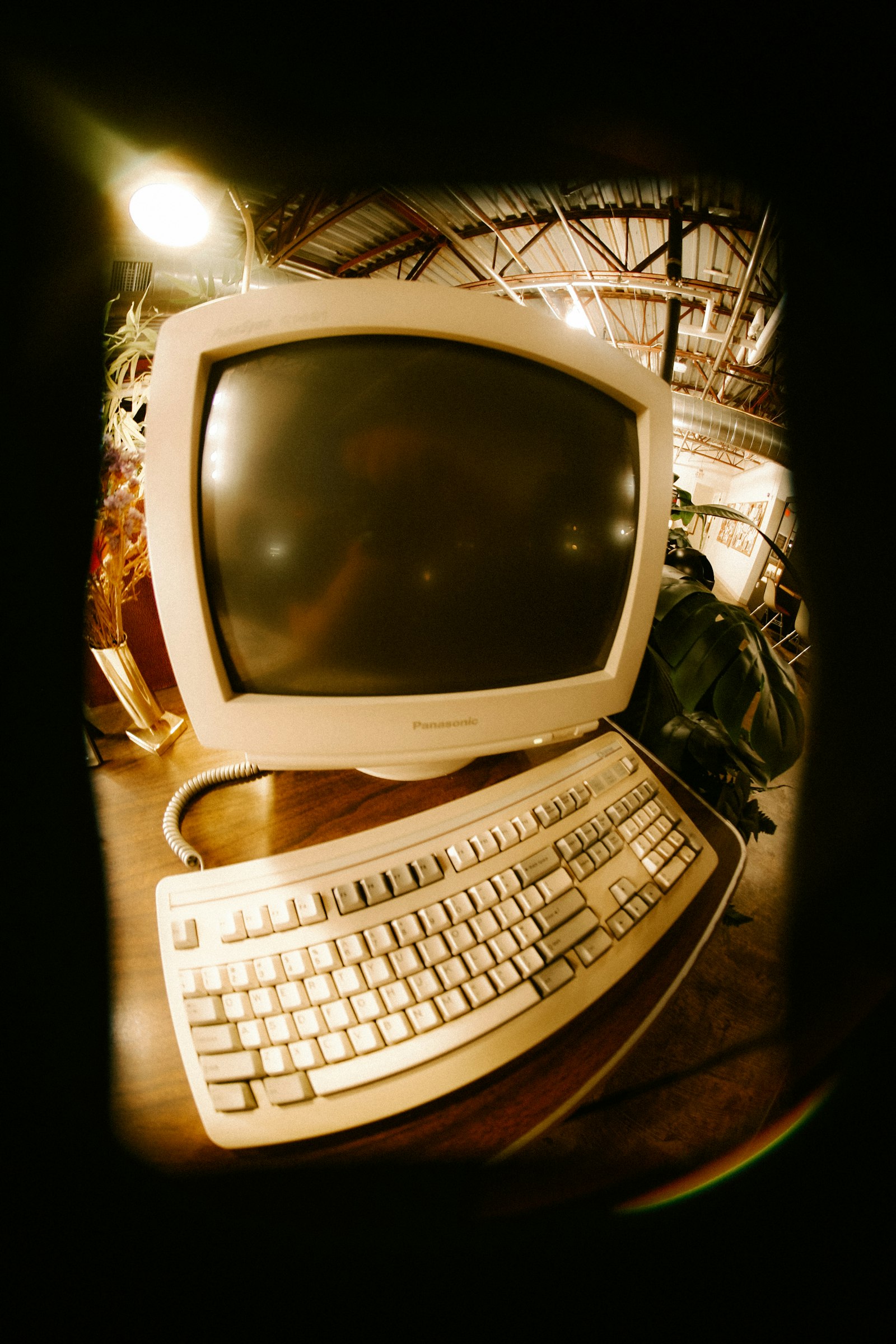 Outdated beige CRT computer and keyboard on a desk, symbolizing a neglected contractor website