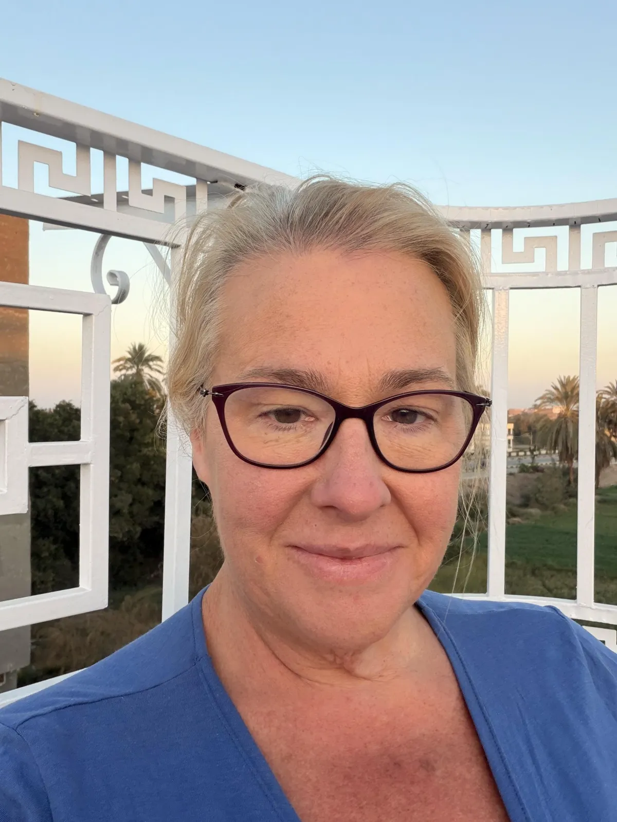 Kristin Ford selfie in blue top on roof deck