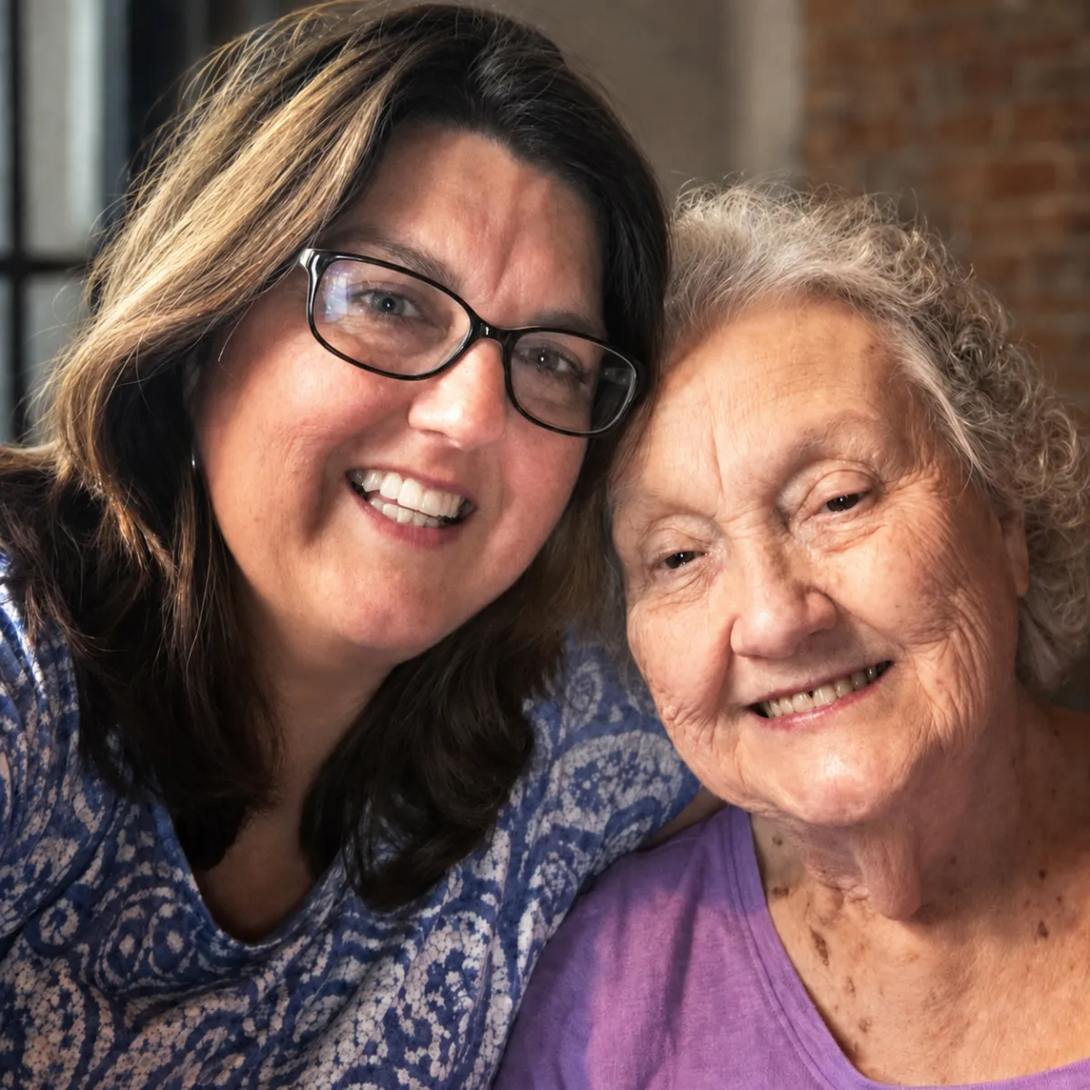 Chasity’s mother and grandmother smiling together.