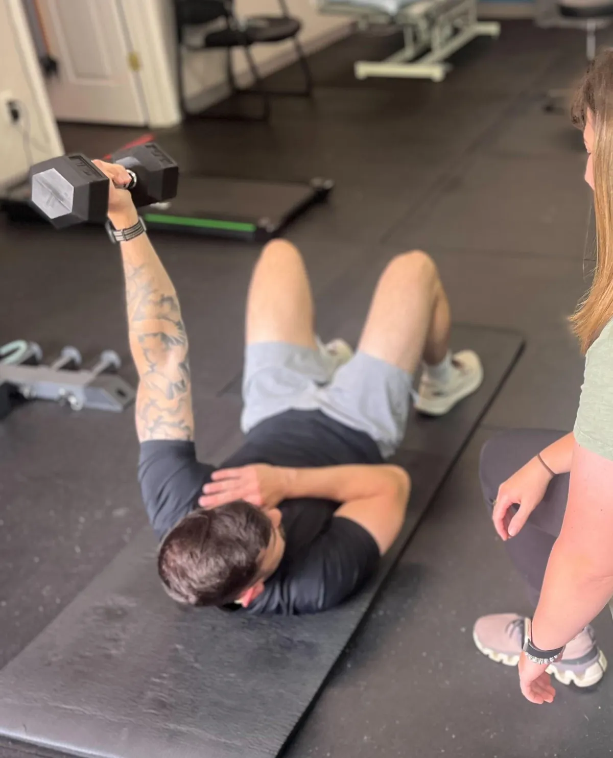 a man doing a turkish get up