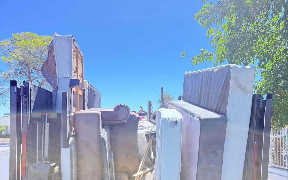 Appliances and junk loaded for disposal