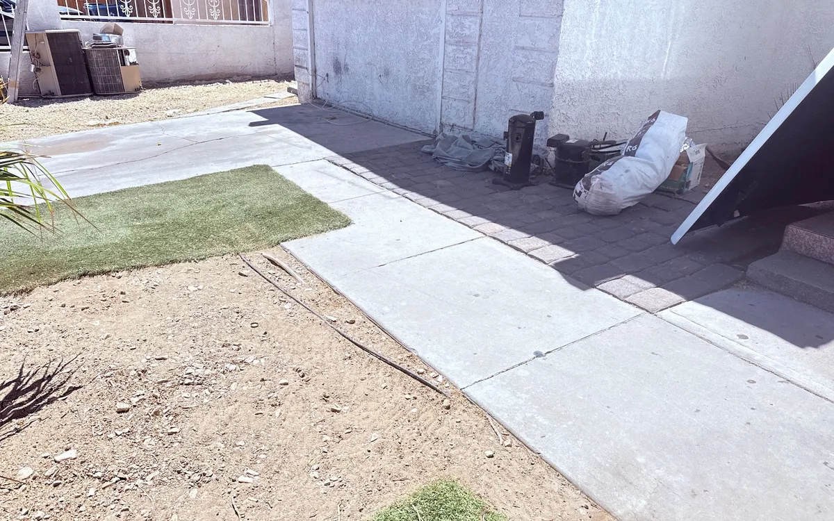 Bagged debris gathered for removal from a property